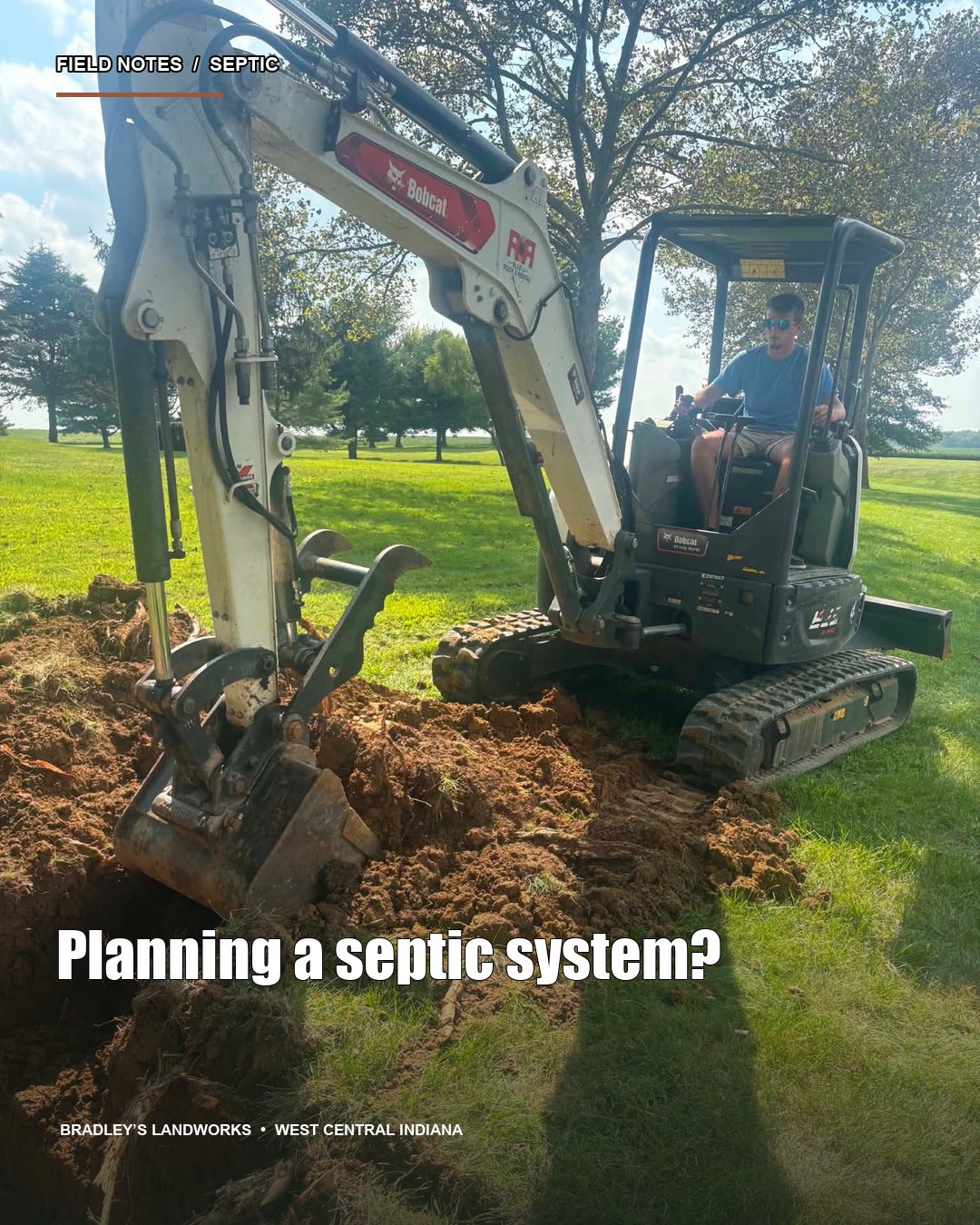 Excavator digging for a septic system